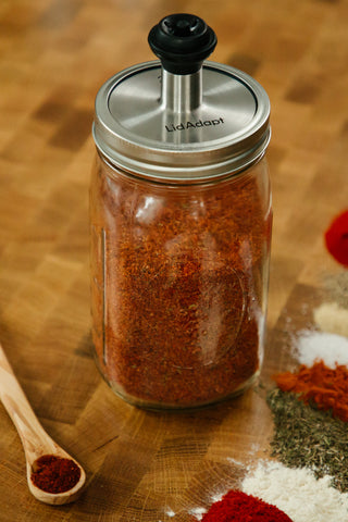 Kaug LidAdapt 2.0 featured on our Culinary Kit Medium Batch with 32 oz clear glass wide mouth mason jar, vacuum stopper and pump to vacuum seal and store spice blends.